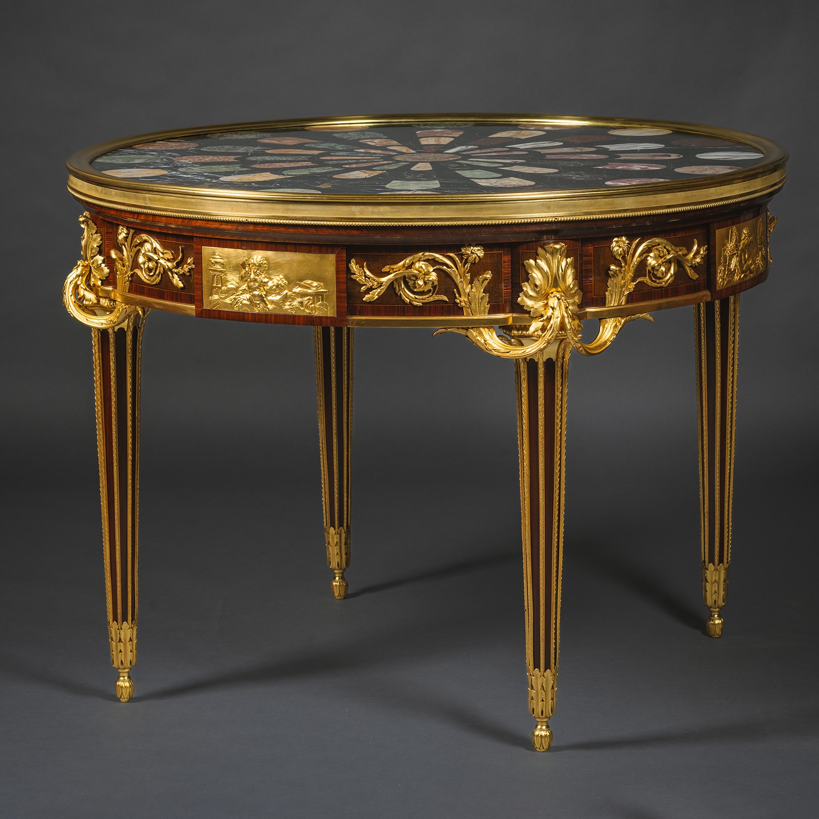 A Rare Gilt-Bronze Mounted Mahogany Centre Table with 'Pietre Dure' Specimen Marble Top