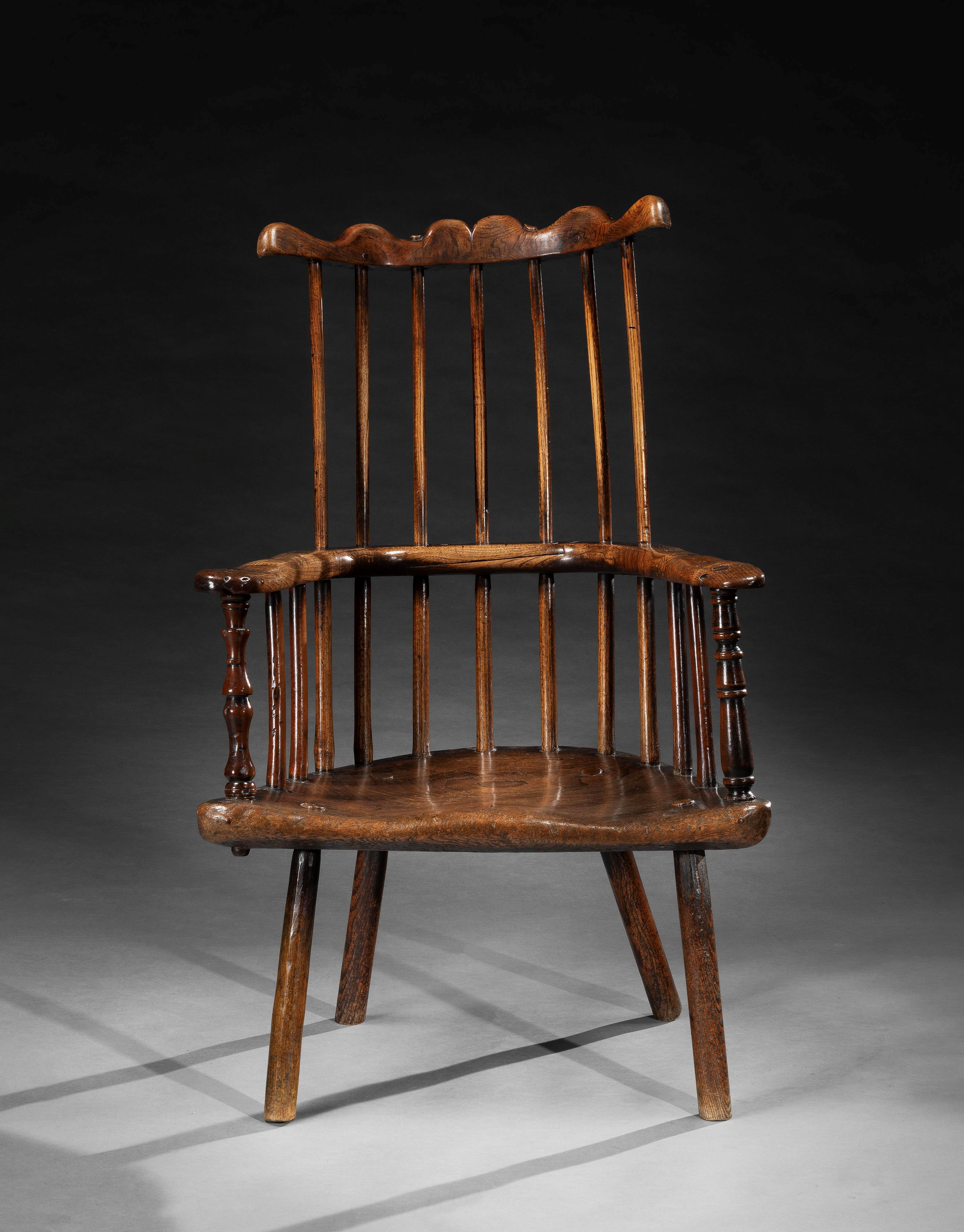 An Exceptional Primitive Comb Back Armchair